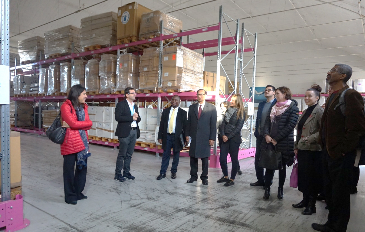 Admiring the well-organized UNHRD warehouse. Admiring the well-organized UNHRD warehouse.